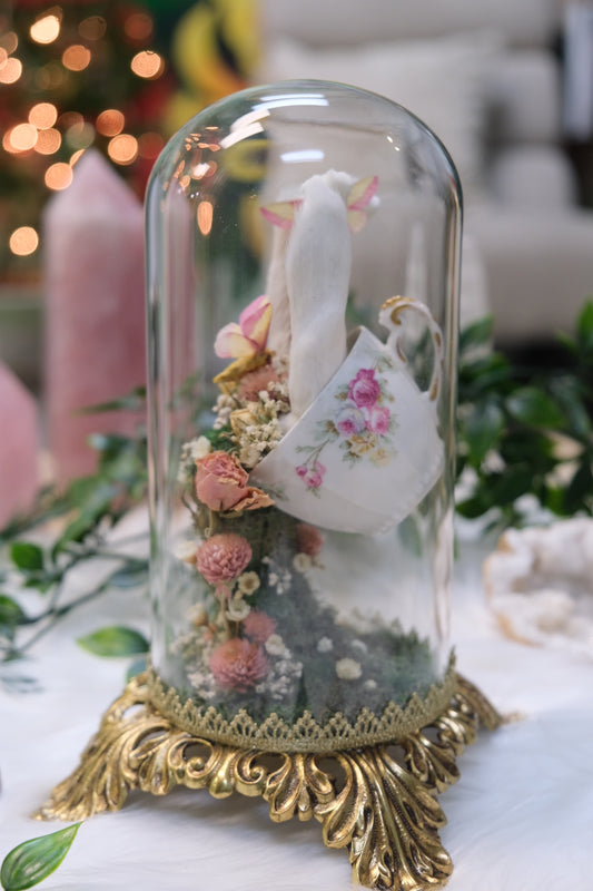 Pouring Tea Cup with Rosy Maples