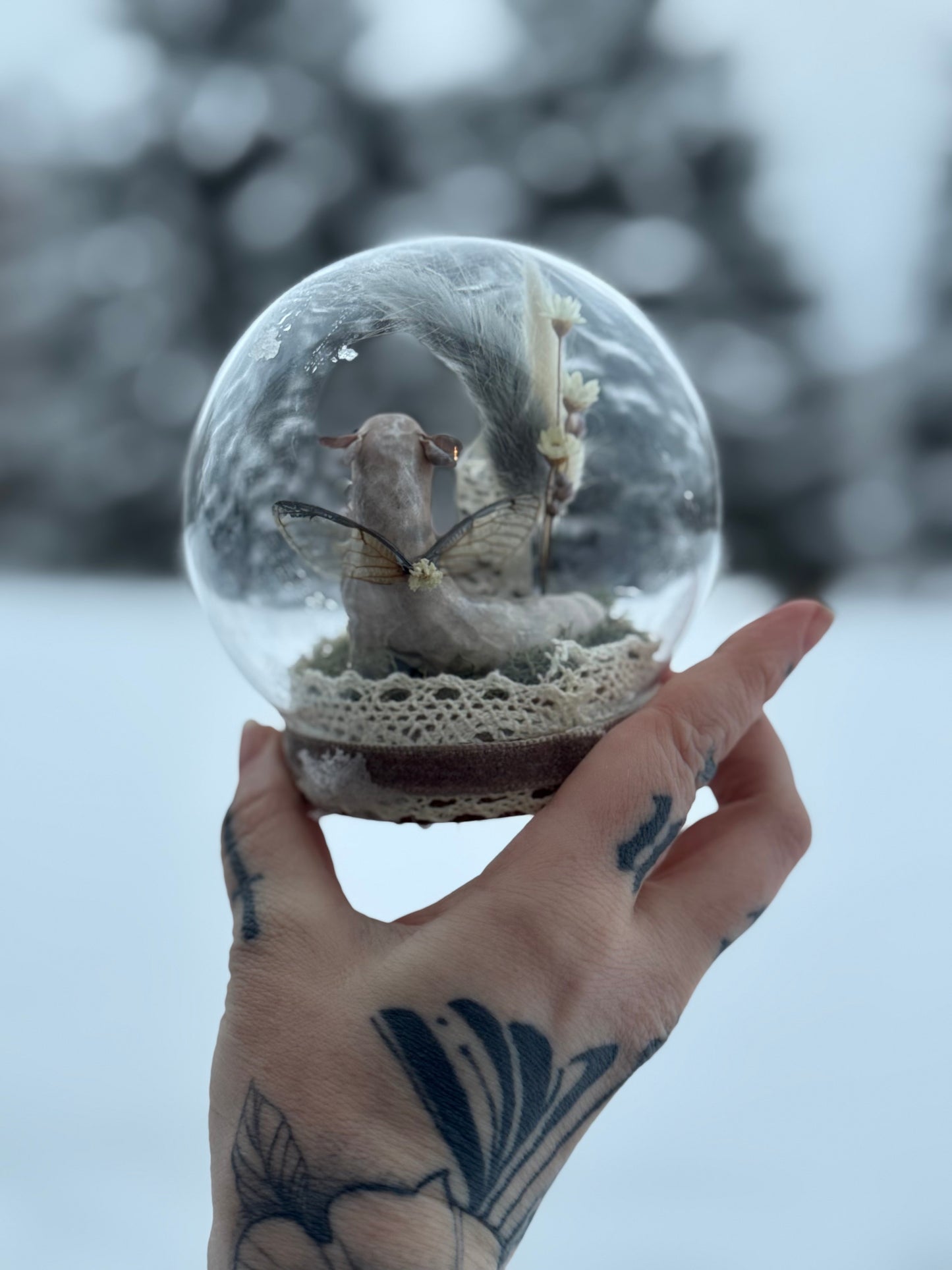 A Silver Winged Wyrmling with Tourmalinated Quartz