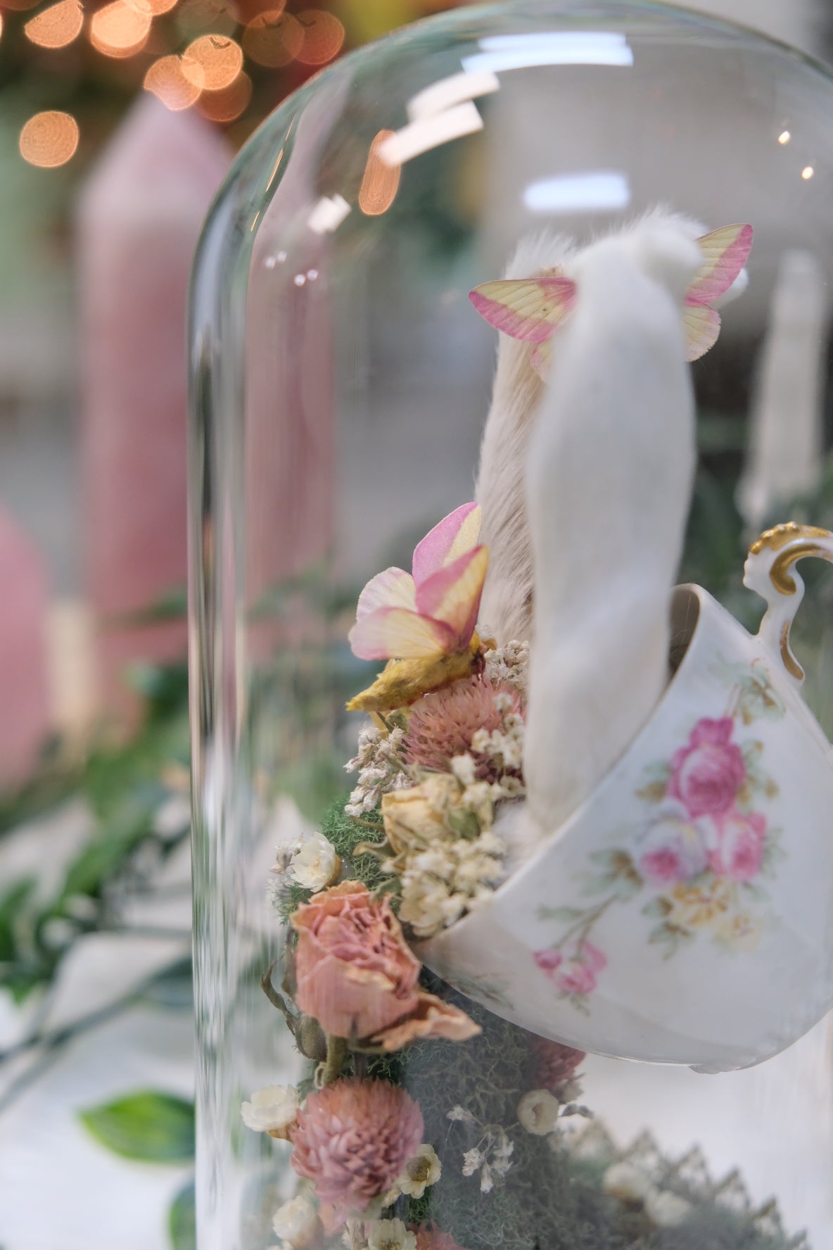 Pouring Tea Cup with Rosy Maples